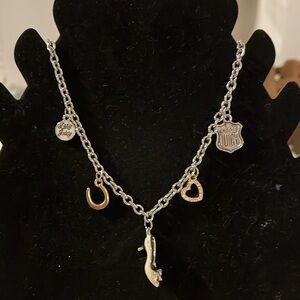 Juicy Couture with adorable charms necklace.